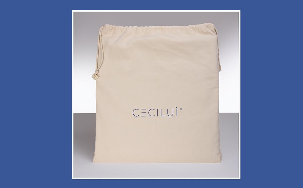 Sac en coton rectangulaire avec lacets sur le dessus pour la fermeture de couleur crème.